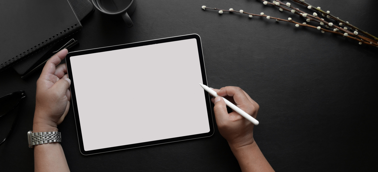 Person Holding White Tablet Computer